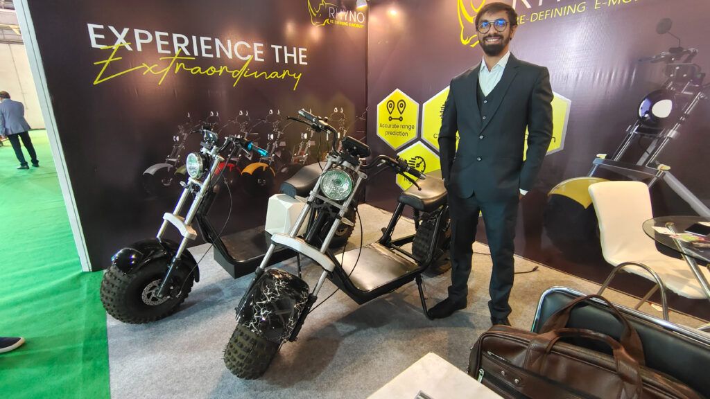 Vishal Dhamecha, Founder - Rhyno Wheels Private Limited standing next to the Rhyno electric scooter (Image: Green Wheels India)